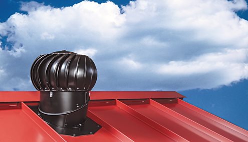 Ventilation turbine mounted on a metal roof directly at the ridge for the best operating conditions.